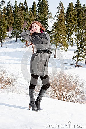 Woman in-field in winter Stock Photo