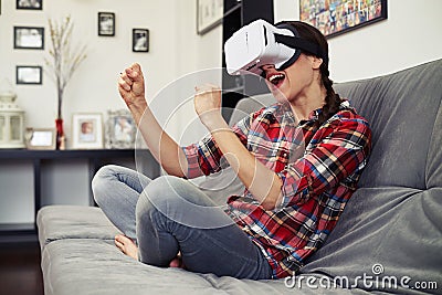 Woman fighting in virtual reality use headset glasses Stock Photo