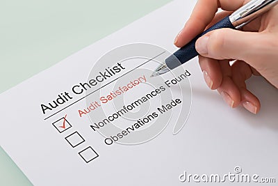 Woman Filling Audit Checklist Form Stock Photo