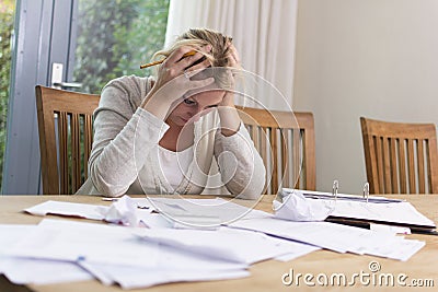 Woman in financial stress Stock Photo