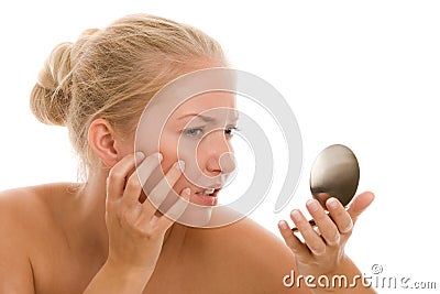 Woman finding acne Stock Photo