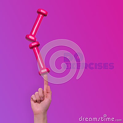 Woman hand taking easy pink dumbbells Stock Photo