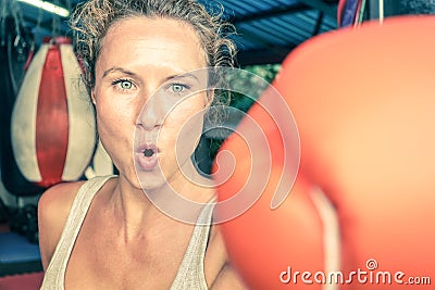 Woman at fit boxing training in urban sport gym Stock Photo