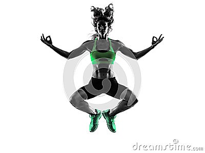 Woman fitness jumping serene zen exercises silhouette Stock Photo