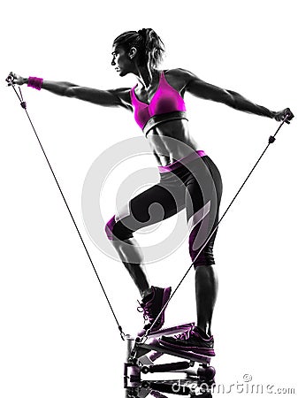 Woman fitness stepper resistance bands exercises silhouette Stock Photo