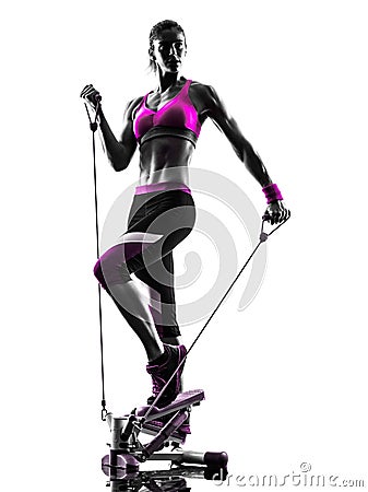 Woman fitness stepper resistance bands exercises silhouette Stock Photo