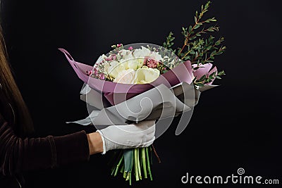 Woman holding flower bouquet Stock Photo