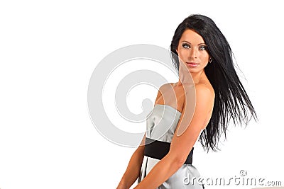 Woman with flowing hair looks mysteriously Stock Photo