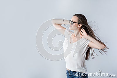 Woman with fluttering hair with wind Stock Photo