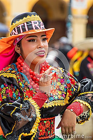 A woman folk dancer from Cayambe Canton, Pichincha Province, Ecuador Editorial Stock Photo