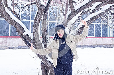 Woman in forest, portrait of a woman in winter forest, cute woman in winter park Stock Photo