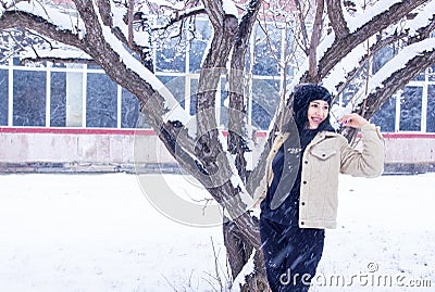 Woman in forest, portrait of a woman in winter forest, cute woman in winter park Stock Photo