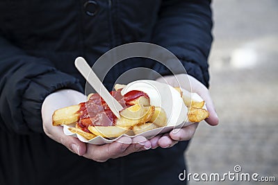 Woman with french fries Stock Photo