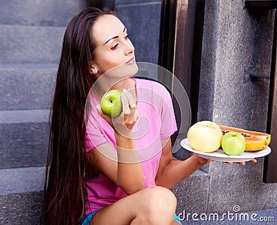 Woman with fruit Stock Photo