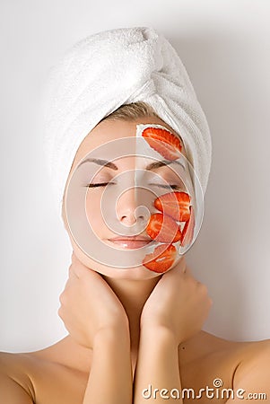 Woman with fruit mask Stock Photo