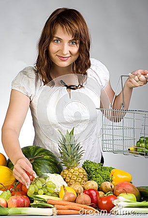 Woman with fruit & veggies Stock Photo