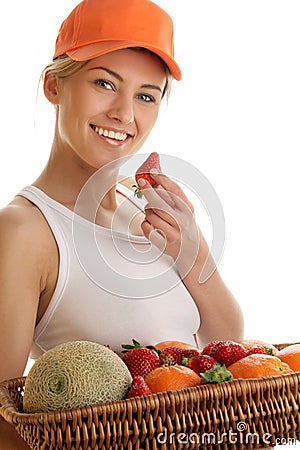 Woman with basket of fruits Stock Photo