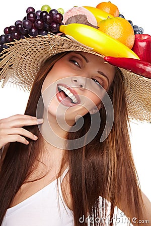 Woman with fruits headwear. Stock Photo