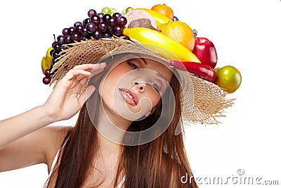 Woman with fruits headwear. Stock Photo