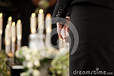 Woman at funeral mourning Stock Photo