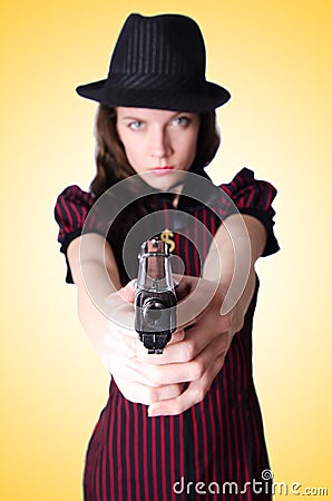 Woman gangster with handgun Stock Photo