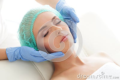Woman getting palpation massage treatment. Recreation, Rejuvenation, Health, Massage, Healing Concept. Stock Photo
