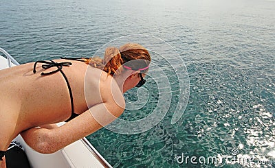 Woman getting seasick on boat Stock Photo