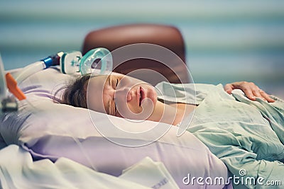 Woman giving birth in maternity hospital. Childbirth. Pregnant woman breathing during contractions Stock Photo