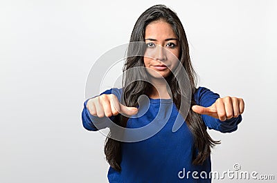 Woman giving an equal thumbs gesture Stock Photo