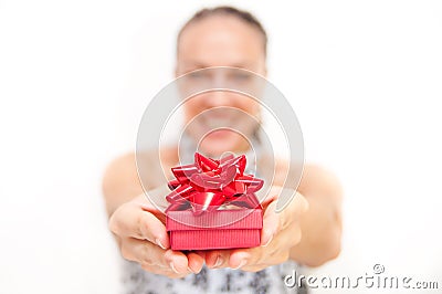 Woman giving present Stock Photo