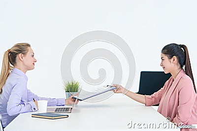 Woman Giving resume to officer for job interview Stock Photo