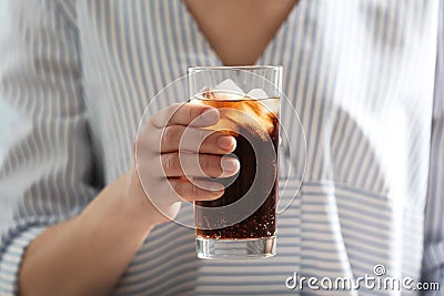 Woman with glass of cold cola Stock Photo