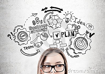 Woman in glasses and business plan Stock Photo