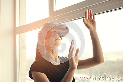 Woman with glasses of virtual reality. Future technology concept. Modern imaging technology. Stock Photo