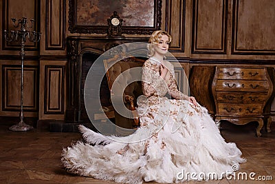 Woman in golden dress in retro style Stock Photo