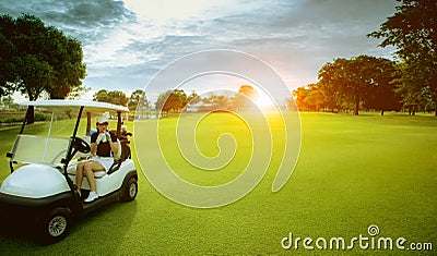 Woman golfer drinking cool water in golf sport field Stock Photo