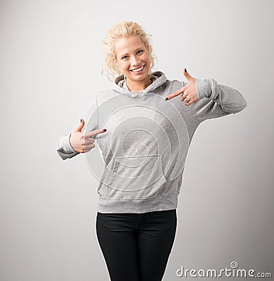 Woman in gray hoodie, mockup for logo or branding design Stock Photo