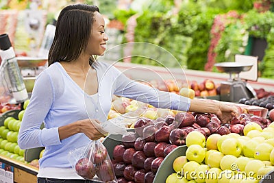 Woman at Grocery Store Stock Photo