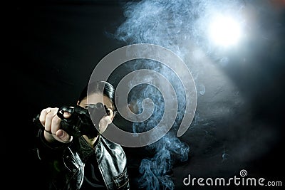 Woman with gun Stock Photo