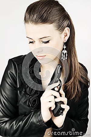 Woman with a gun Stock Photo