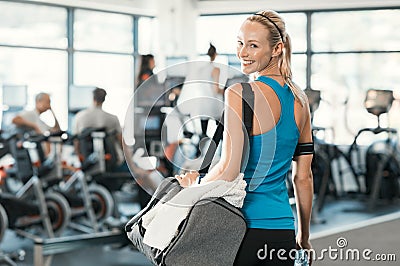 Woman with gym bag Stock Photo