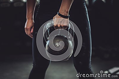 Woman with Kettlebell Stock Photo