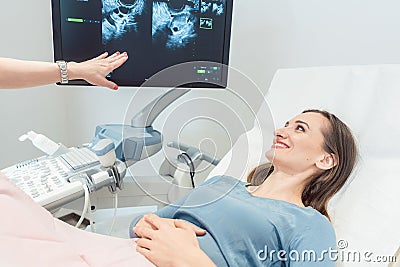 Woman at the gynecologist having ultrasonic examination Stock Photo