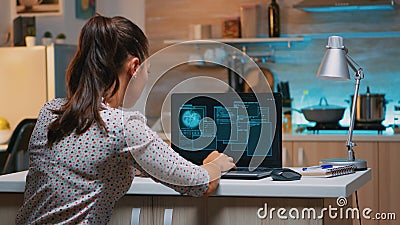 Woman hacker coding html and programming on screen laptop Stock Photo