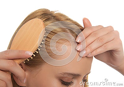 Woman with hair loss problem on white background, closeup. Trichology treatment Stock Photo