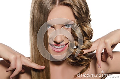 Woman with haircut keeps hair in hands Stock Photo