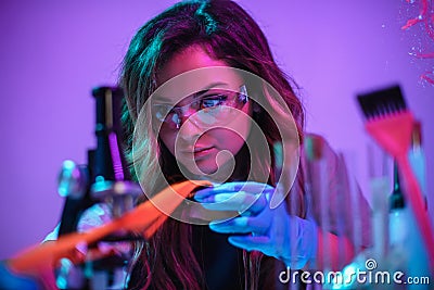 Colorist hairdresser works. Stock Photo