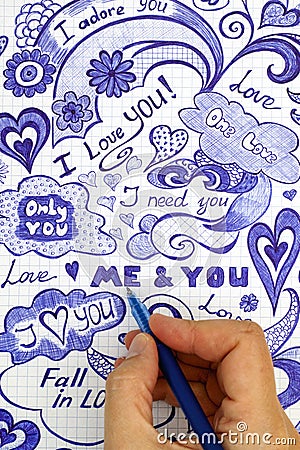 Woman hand with ballpoint pen draws love doodles messages Stock Photo