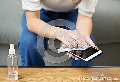 Woman, hand and clean phone screen or disinfection wipe for hygiene bacteria, dust wellness or safety. Female person Stock Photo