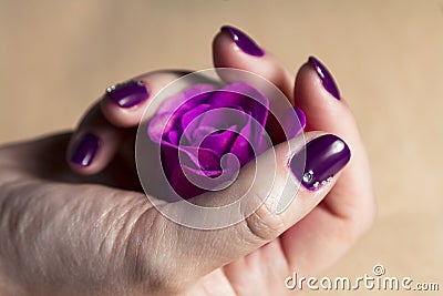 Woman hand with colorful nails macro Stock Photo